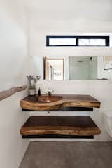 En-suite bathroom with handmade Guanacaste sink