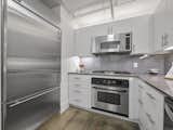 Kitchen with built-in refrigerator