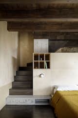 A combination of materials lightly blend as one arrives in the main bedroom