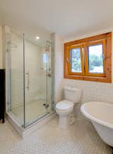 Bathroom with clawfoot tub and shower