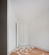 Laundry area hidden in the wall.