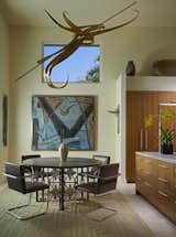 Breakfast area: John Raimondi, “Abaris” Bronze mobile, 1992; Gregory Amenoff, “Last Light”, 1979; American cast iron art deco table base; Willy Wuilleumier Ceramic Vase, 1925