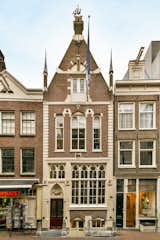 The facade is remarkably unique for the city, built in the rare Willem II Gothic style. Architectural classes are often given in front of the house to students learning the evolution of Dutch architecture.
