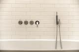 Metro tiles are used again to reflect light, a precious commodity in The Netherlands.