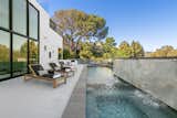  Photo 7 of 9 in Newly Constructed, Three-Story Residence with a State-Of-The-Art Cinema in Palisades Riviera Lists for $21.85M by CompassCa