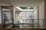 Staircase, Metal Tread, Wood Tread, Metal Railing, Glass Railing, and Concrete Tread  Photo 1 of 20 in R House by Studio Arthur Casas
