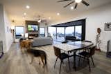 Living Room looking out into the backyard from the 14' La Cantina sliding door - with the Couple's basset hounds