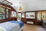 Secondary bedroom with separate garden entrance makes this a great nanny or guest quarters. Oversized rafter window is absolutely cool and unusual.
