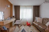 The whole combination give a feeling of warmth that contrasts with the bustling city.
  Photo 20 of 22 in Globa Apartment by Ariel Glot