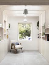 A large picture window from 1st Folding Sliding Doors frames the apple tree in the garden, as well as allowing natural light into the room.