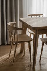Custom made dining table framed with classic J77 and J14 chairs from HAY.