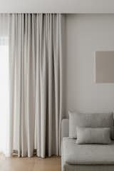 Main living space composed using a soft palette of natural materials.
