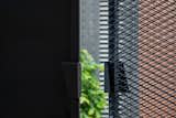 We played with different textures of black steel to help craft the handle of our gate making it part of our design language.