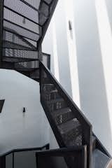 The stairs were made in perforated steel to let maximum daylight seep through the void at the back of the house allowing the bathrooms and study area to indulge.