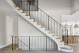 Staircase, Metal Railing, and Wood Tread Staircase  Photo 8 of 15 in The Marshall House by Art & Stone Group