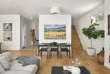 Dining Room, Chair, Table, Ceiling Lighting, Recessed Lighting, and Light Hardwood Floor Hallway & Stairs  Photo 3 of 27 in The Avondale Home by Art & Stone Group