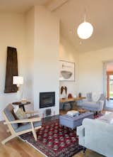 Living Room, Chair, Lamps, Medium Hardwood Floor, Light Hardwood Floor, Sofa, Ottomans, End Tables, and Ceiling Lighting  Photos from Mocabee Residence