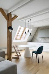 Dining Room, Table, Pendant Lighting, Medium Hardwood Floor, and Chair  Photo 8 of 27 in Art Maisonette in Letná by esté architekti