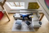 Living Room, Sofa, Coffee Tables, and Medium Hardwood Floor  Photo 11 of 27 in Art Maisonette in Letná by esté architekti