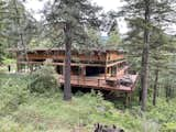 Exterior, House Building Type, Metal Roof Material, and Wood Siding Material looking down on the house  Photo 2 of 12 in Beyond the Sea by john pasternak