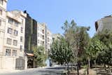 the house is located in a residential neighborhood in Tehran where all the surrounding buildings are 5 story apartment houses