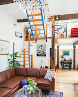 Living Room, Ceiling Lighting, Console Tables, Coffee Tables, Sectional, and Medium Hardwood Floor Main Living Space  Photo 4 of 24 in Cambridge Townhouse by SKA