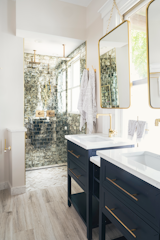 Bath Room, Ceramic Tile Floor, Marble Counter, Subway Tile Wall, Open Shower, and Undermount Sink Primary Bathroom Shower  Photo 16 of 24 in Cambridge Townhouse by SKA