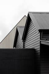 Exterior, Wood Siding Material, Metal Roof Material, House Building Type, and Gable RoofLine Hint of the new building beyond  Photo 2 of 13 in Barwon Heads House by Adam Kane