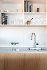 Kitchen, Ceramic Tile Backsplashe, Quartzite Counter, Wood Cabinet, Undermount Sink, and Ceiling Lighting  Photo 8 of 20 in Kate's apartment over Budapest by Gergely Locsei