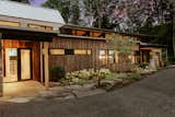 Exterior, Gable RoofLine, Shed RoofLine, Metal Roof Material, Wood Siding Material, and House Building Type Elk Mountain Ridge Front Entry Twilight   Photo 3 of 26 in Elk Mountain Ridge by Robi Eckley