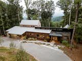 Exterior, House Building Type, Shed RoofLine, A-Frame RoofLine, Wood Siding Material, Metal Roof Material, and Stone Siding Material Elk Mountain Ridge Front Elevation Daytime  Photo 5 of 26 in Elk Mountain Ridge by Robi Eckley