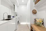 Laundry Room, White Cabinet, Engineered Quartz Counter, and Side-by-Side  Photo 15 of 41 in Angelfish by Henriette Werner