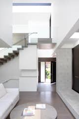 A skylight on the upper level further illuminates the living spaces on the main floor.&nbsp;