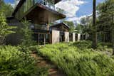 Exterior, House Building Type, Wood Siding Material, Butterfly RoofLine, Glass Siding Material, Metal Siding Material, and Metal Roof Material  Photo 6 of 30 in August Moon by SPAN Architecture