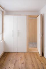 Bedroom, Wardrobe, Medium Hardwood Floor, and Storage  Photo 6 of 22 in M01 by MINIMO