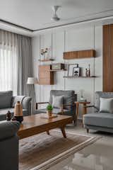 Sofa, Ceiling Lighting, Living Room, Table Lighting, Wall Lighting, Accent Lighting, and Chair  Photo 2 of 15 in Minimal and serene House by Urvi Mistry