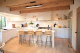 Kitchen Main Floor Viking Appliances, Vintage Bar Stools, Prep Sink, Walnut Blasted Ceilings. 