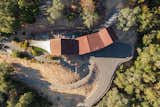 An ariel view of the property reveals the lush vegetation around the home  Terri Harkins’s Saves from A Cor-Ten Steel Home Set on Six Acres in California Wine Country Lists for $2.9M