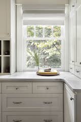 Kitchen, Quartzite Counter, White Cabinet, and Wood Cabinet  Photo 13 of 16 in The Apple House by Mallory Apple