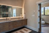 Bath Room, Stone Counter, and Ceramic Tile Floor  Photo 8 of 10 in Perfect Ski Getaway: Somrak Concept + Structure’s Crested Butte Home by Grace Gathright