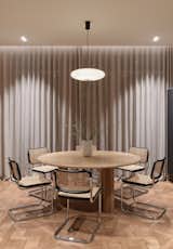 Three leg dining table was designed by our studio