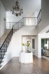 Staircase and Metal Railing  Photo 7 of 19 in Southern Elegance: This Houston Home Blends Traditional With Contemporary Design by Jaclyn Anderson
