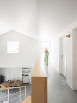 Living Room, Concrete Floor, and Wall Lighting Upper floor and access to the terrace.  Photo 19 of 31 in A holiday home for two French families in Portugal by estudio AMATAM