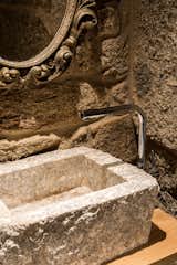 Detail of the animals' granite sink that was recovered and converted into a wash basin.