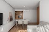 Living room, a 16 sqm space with a small office, a dining, and a living area