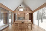 Dining Room, Pendant Lighting, Chair, and Light Hardwood Floor Dining & Kitchen   Photo 7 of 15 in House on the Pond by Atelier Echelle