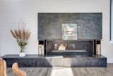Fireplace with sliding panel for TV