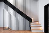 Staircase, Wood Tread, and Metal Railing Back staircase from main living level leading to bedroom level.   Photo 5 of 10 in PITCH Studio by Baky Soumare