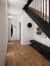 Hallway and Light Hardwood Floor Residence entrance lobby   Photo 9 of 10 in PITCH Studio by Baky Soumare