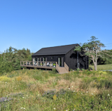 Exterior, Barn Building Type, Shed RoofLine, Metal Roof Material, and Wood Siding Material  Photo 4 of 12 in The Lookout by The Lookout